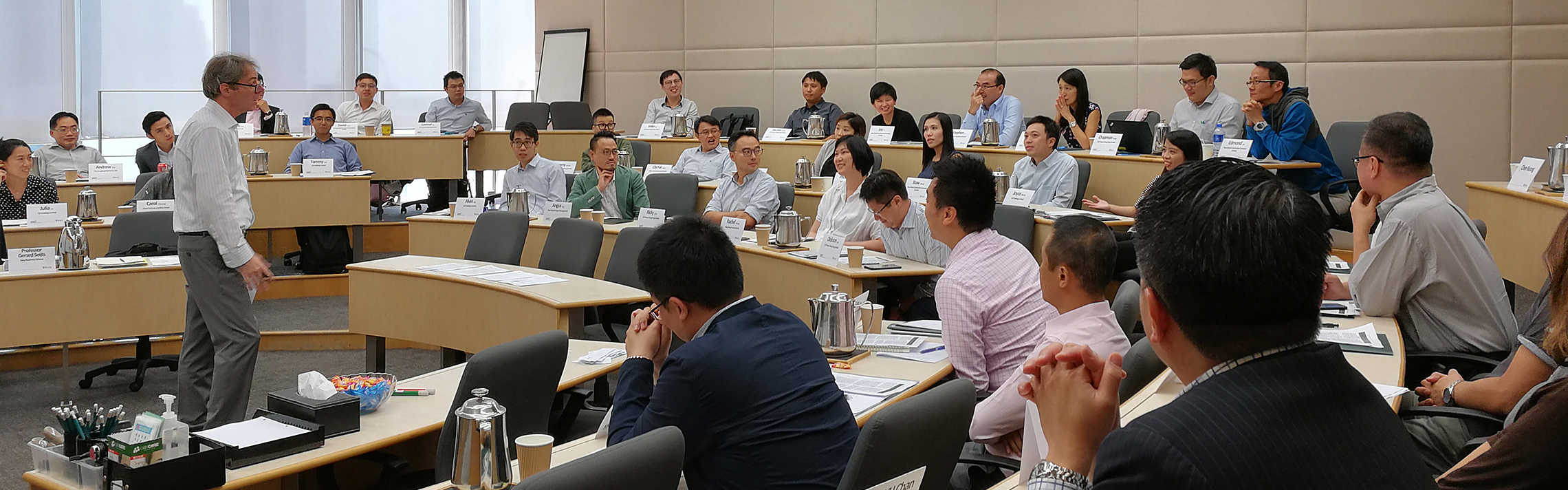 Professor teaching in a classroom.